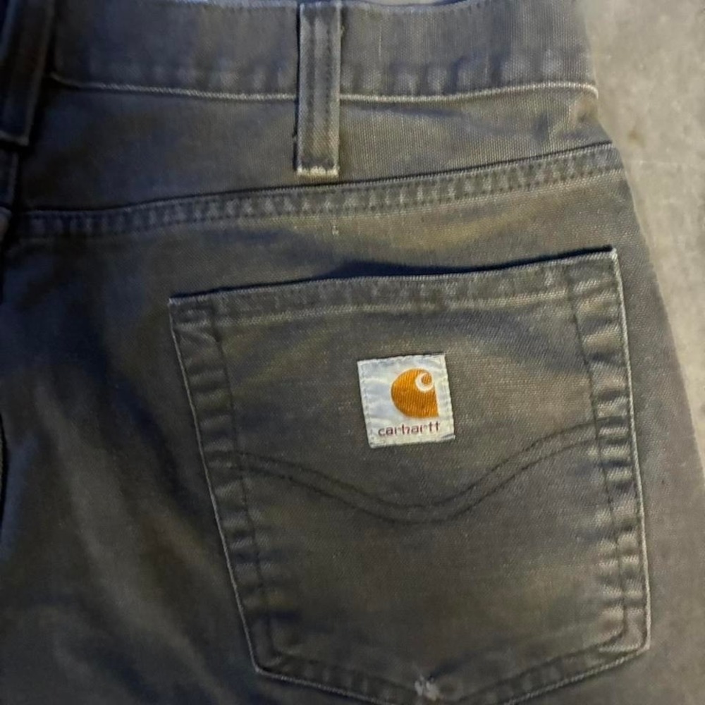 Vintage baggy Carhartt carpenter pants in olive green type color‎